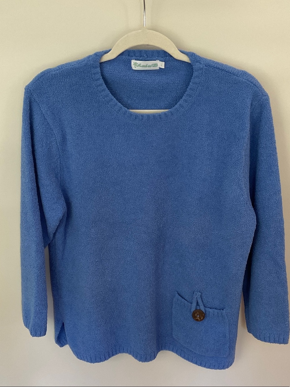 Lulu B Resort wear Sweater in Periwinkle Blue with Button Pocket Detail